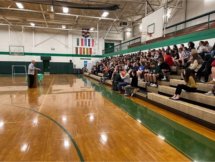 Congressman Wenstrup presenting to the 8th grade class in the gym.